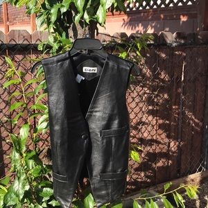 Black real leather vest, fully lined.  So cute on!